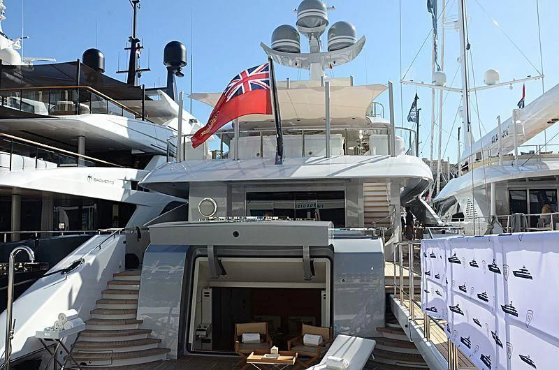 a boat with a flag on the front aboard GALVAS Yacht for Sale
