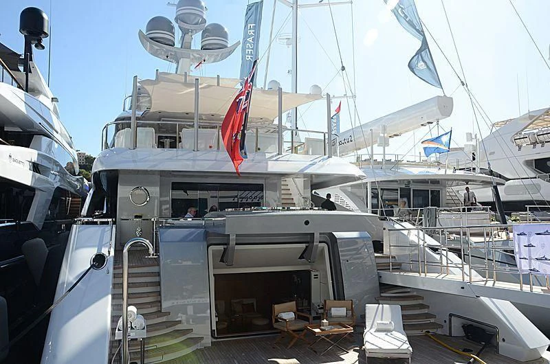 a boat with a flag on the front aboard GALVAS Yacht for Sale