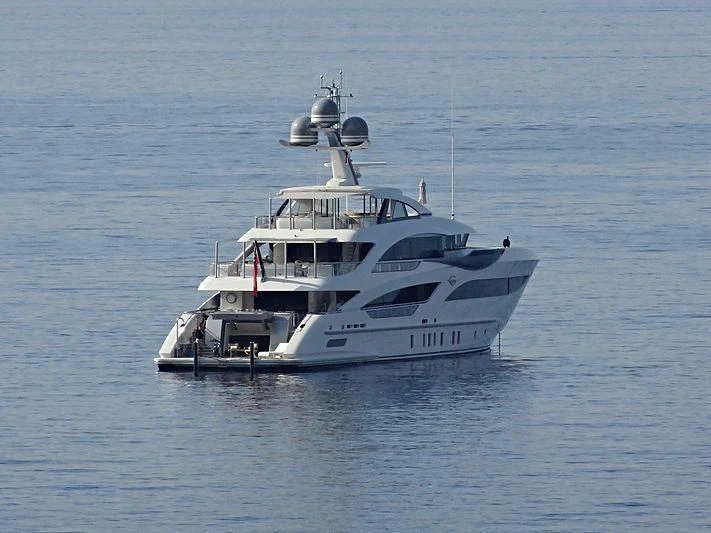 a white boat in the water aboard GALVAS Yacht for Sale