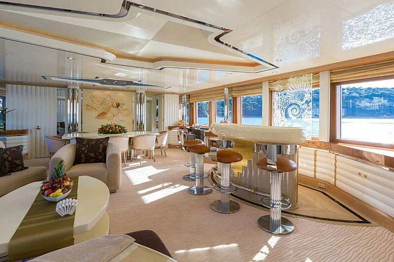 a living room with a large window aboard LORETTA Yacht for Sale