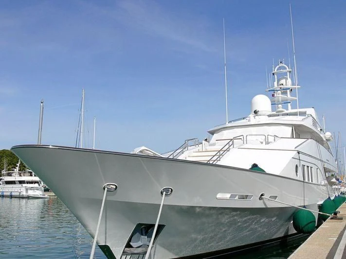 a large white boat in the water aboard LORETTA Yacht for Sale