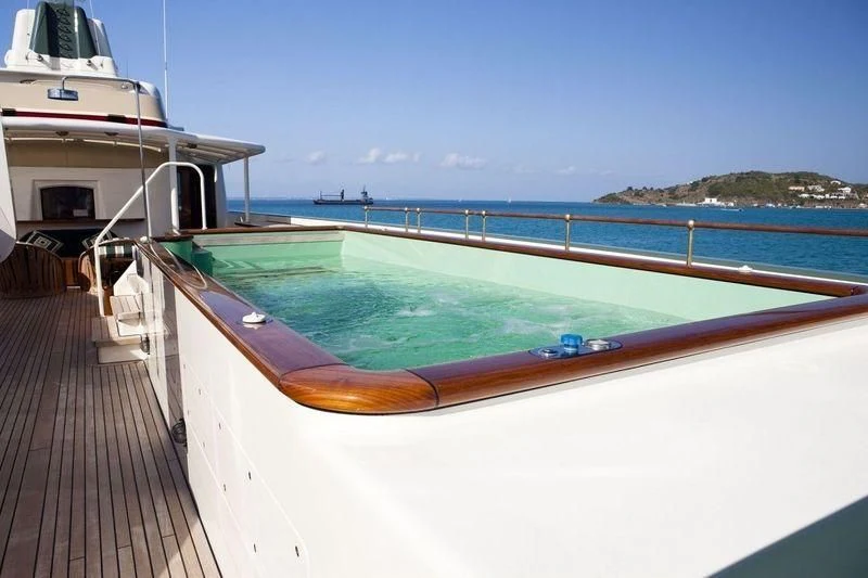 a pool on a deck aboard STEEL Yacht for Sale