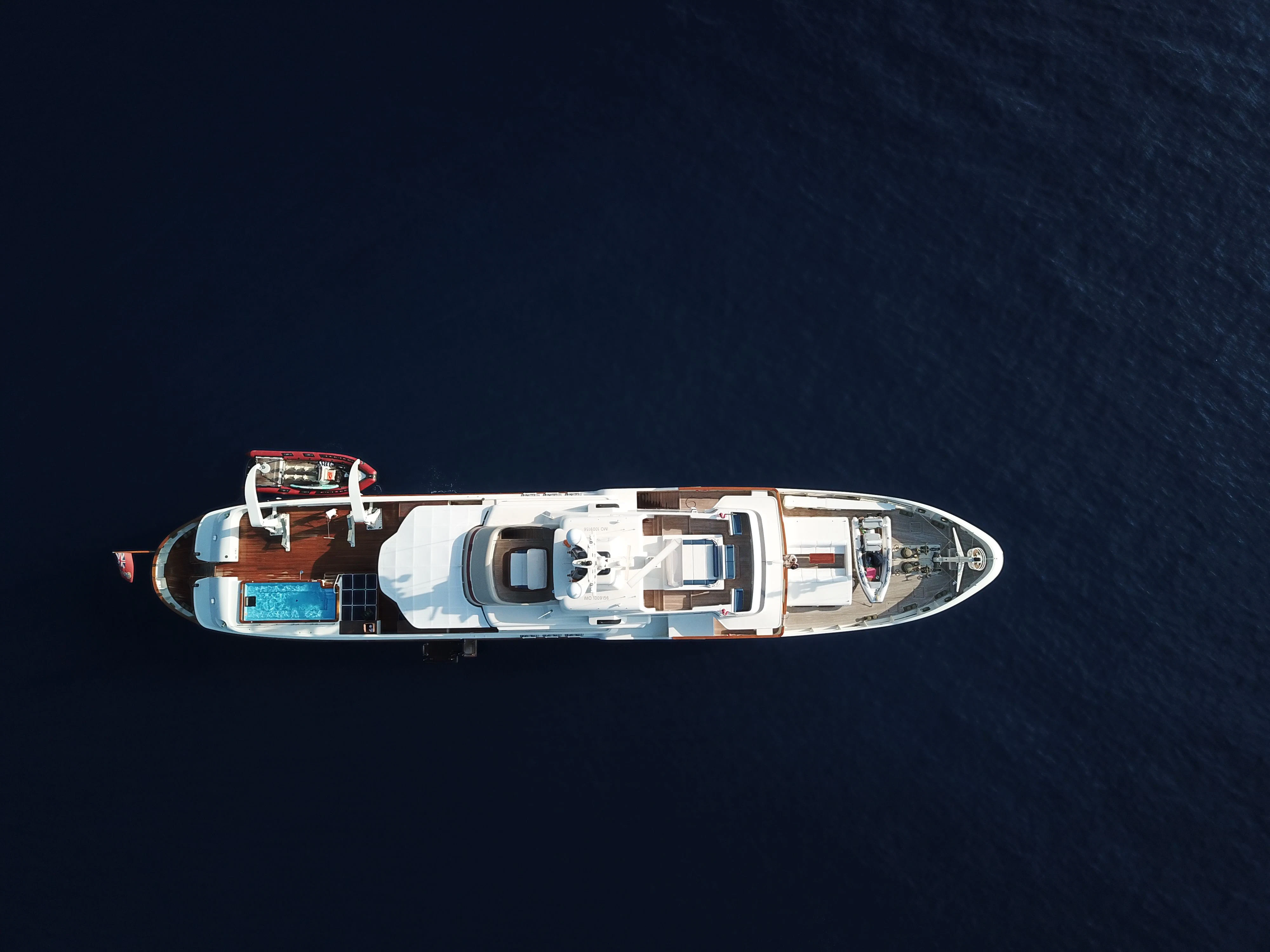 a silver and gold guitar aboard STEEL Yacht for Sale