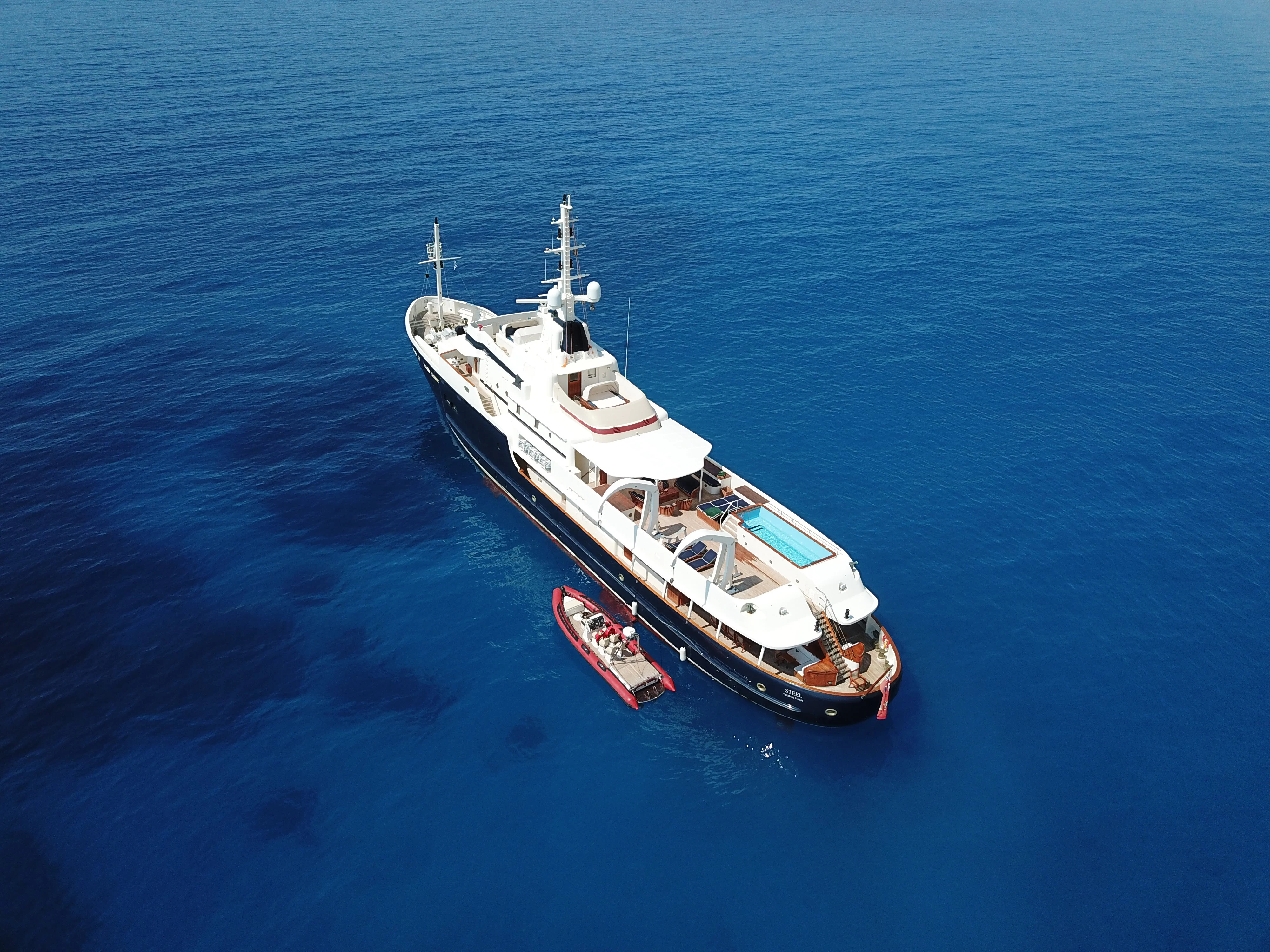 a boat in the water aboard STEEL Yacht for Sale