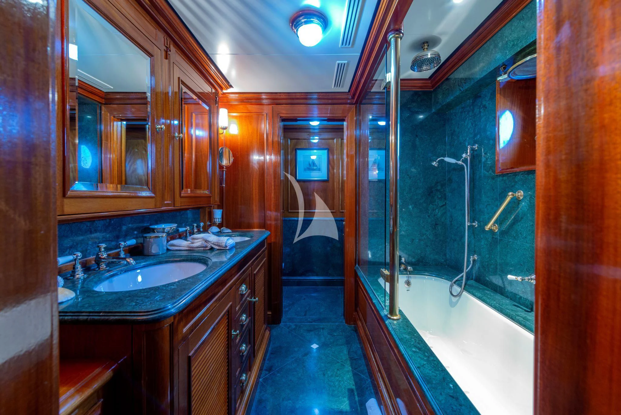 a bathroom with a sink and a shower aboard STEEL Yacht for Sale