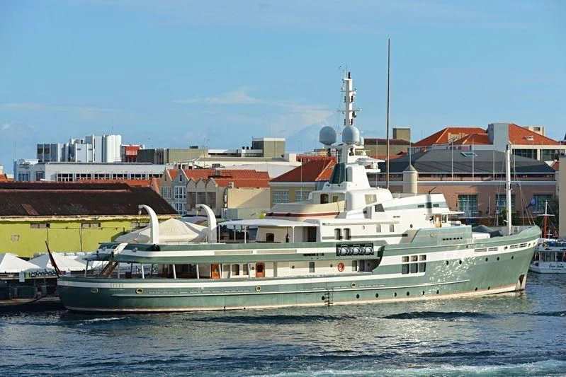 a large white boat in the water aboard STEEL Yacht for Sale