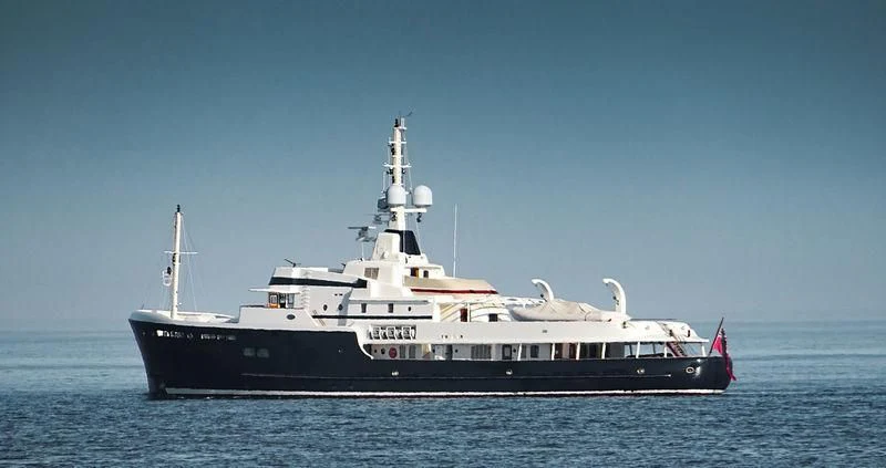 a large boat in the water aboard STEEL Yacht for Sale