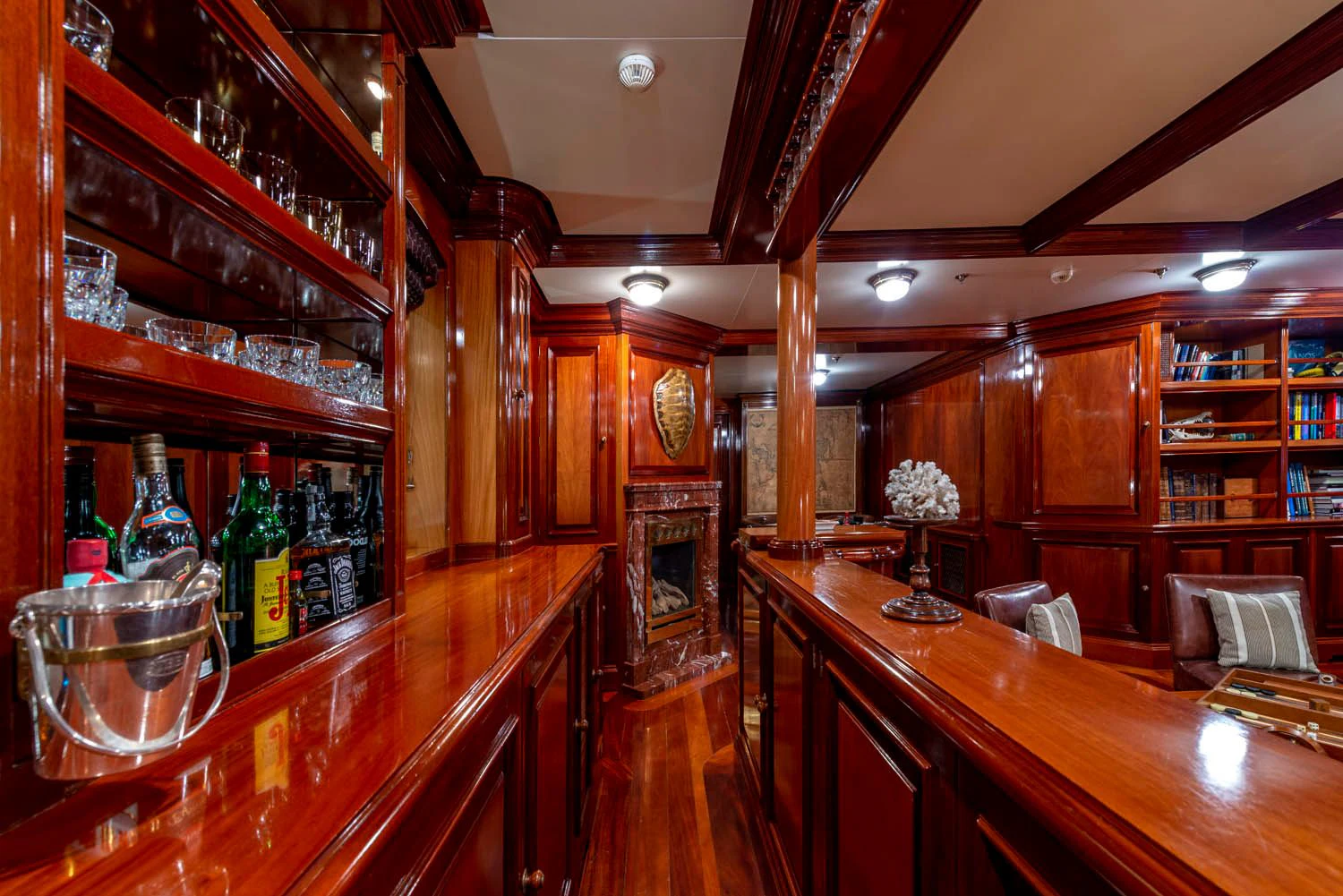 a bar with a table and chairs aboard STEEL Yacht for Sale