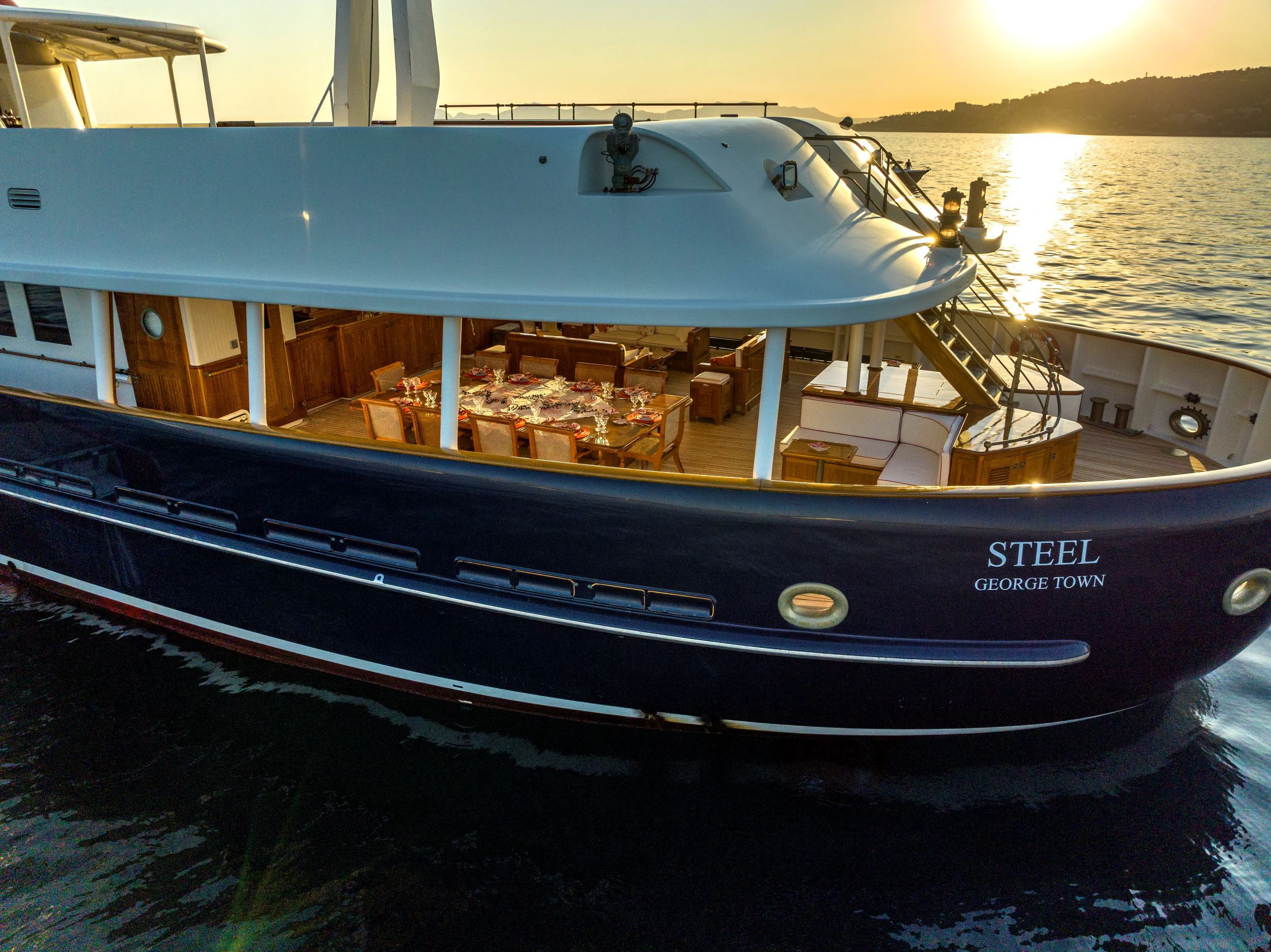 a large boat in the water aboard STEEL Yacht for Sale