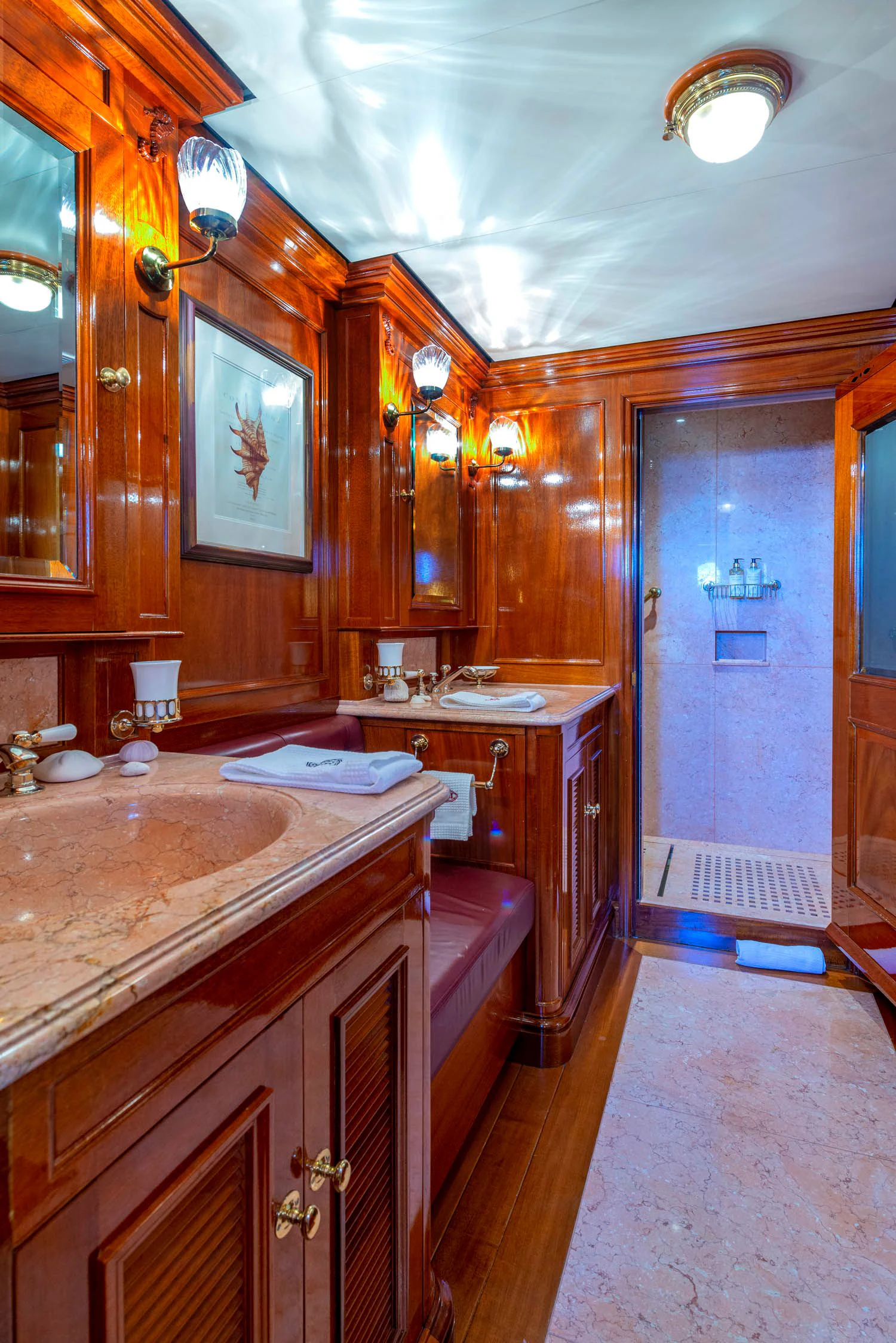 a bathroom with a large countertop aboard STEEL Yacht for Sale