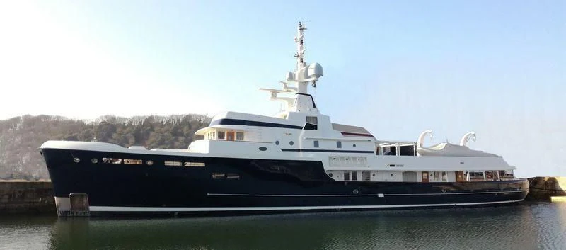 a large ship in the water aboard STEEL Yacht for Sale