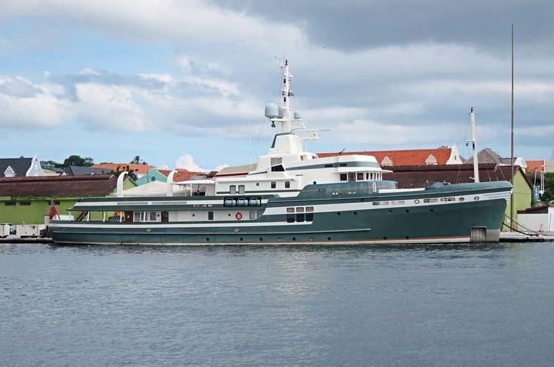 a large ship in the water aboard STEEL Yacht for Sale