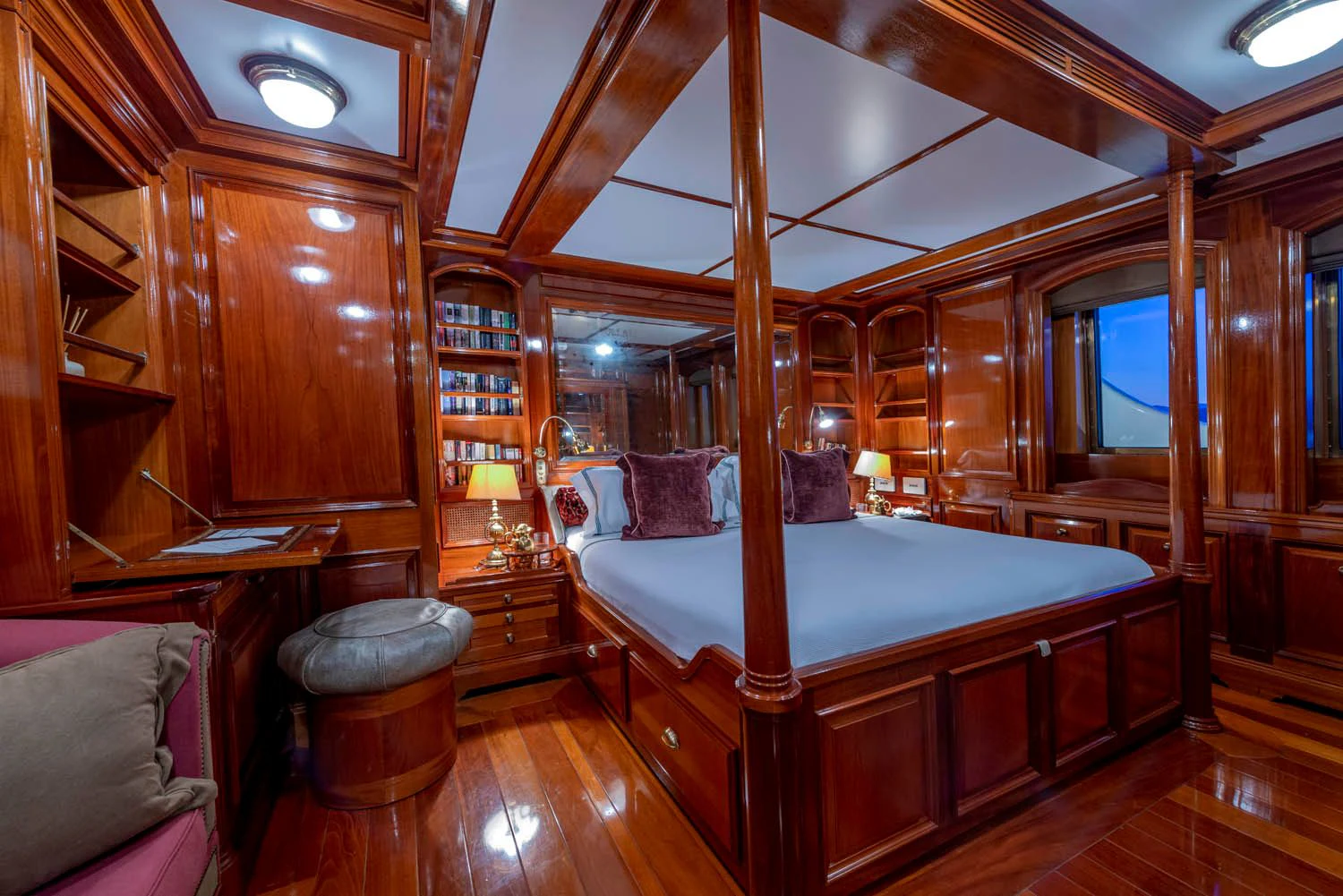 a bed in a room aboard STEEL Yacht for Sale