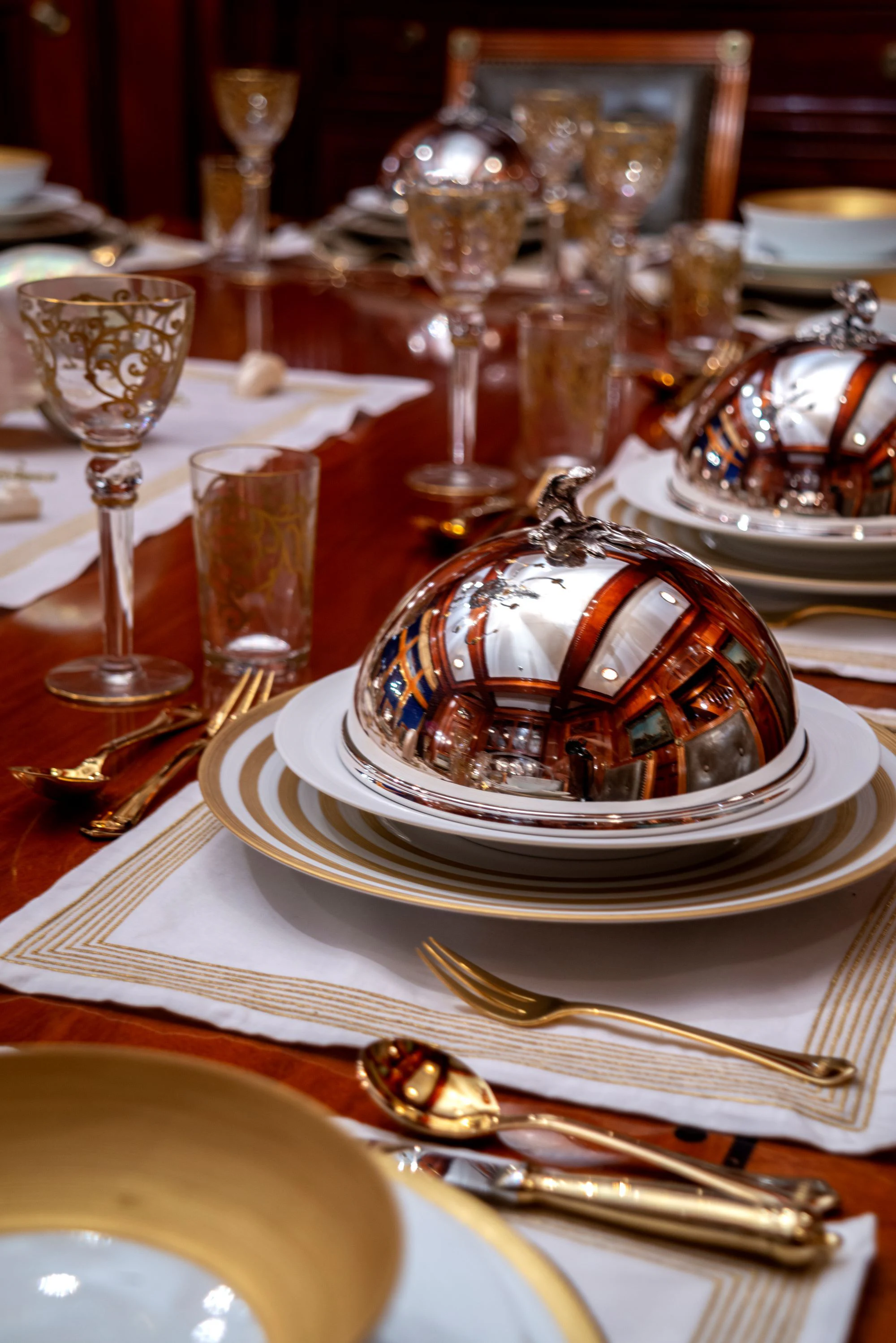 a cake on a plate aboard STEEL Yacht for Sale