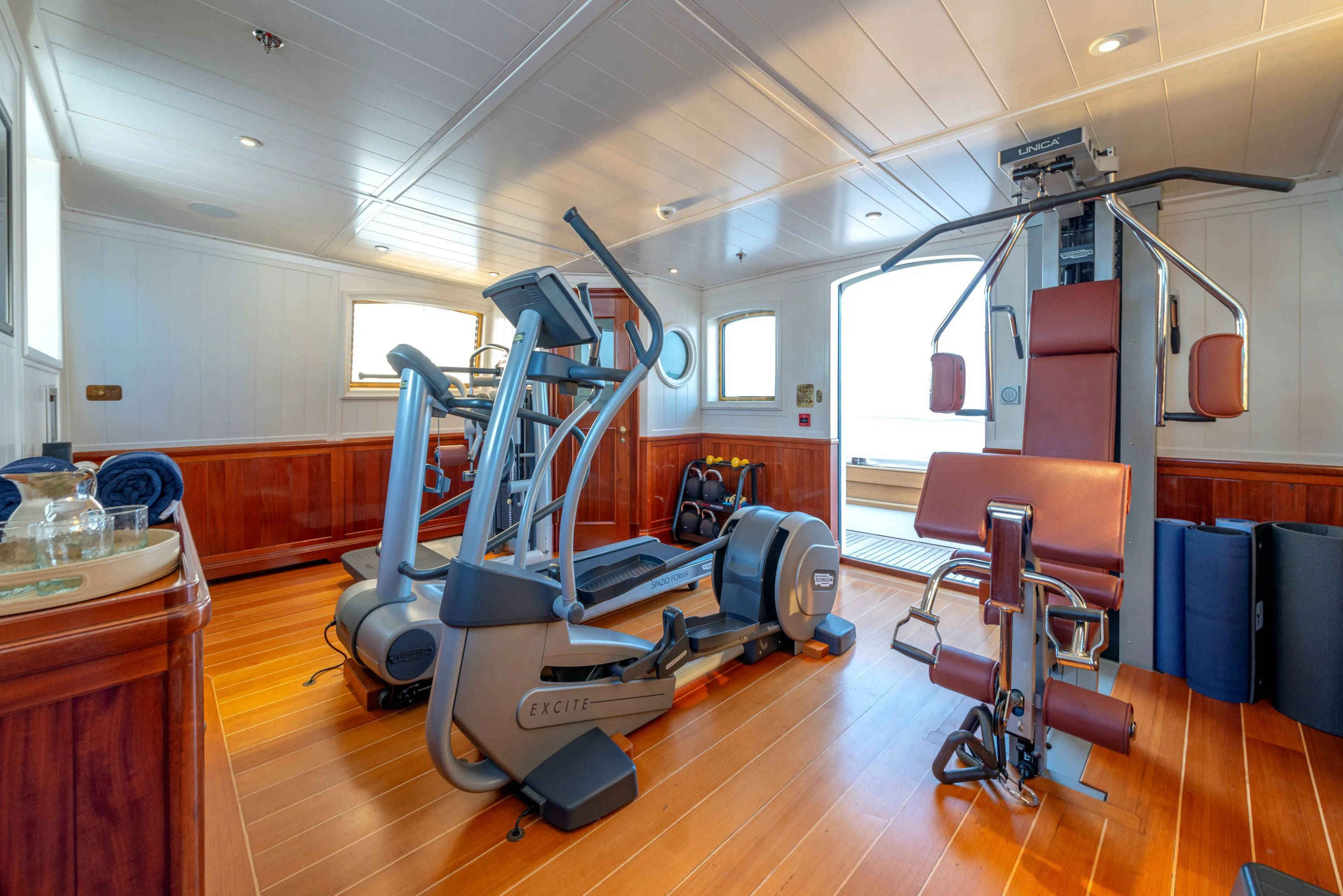 a gym with exercise equipment aboard STEEL Yacht for Sale