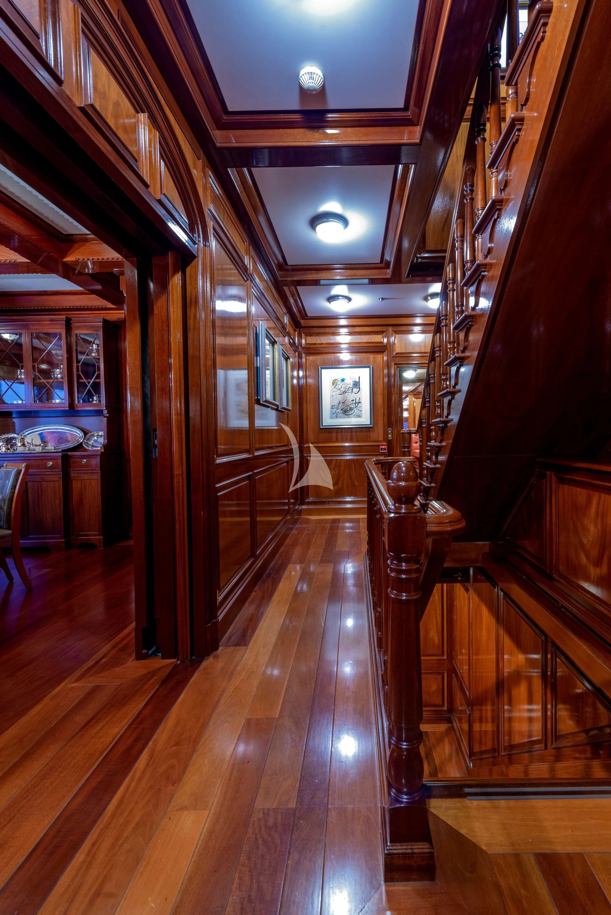 a wood hallway with wood floors aboard STEEL Yacht for Sale