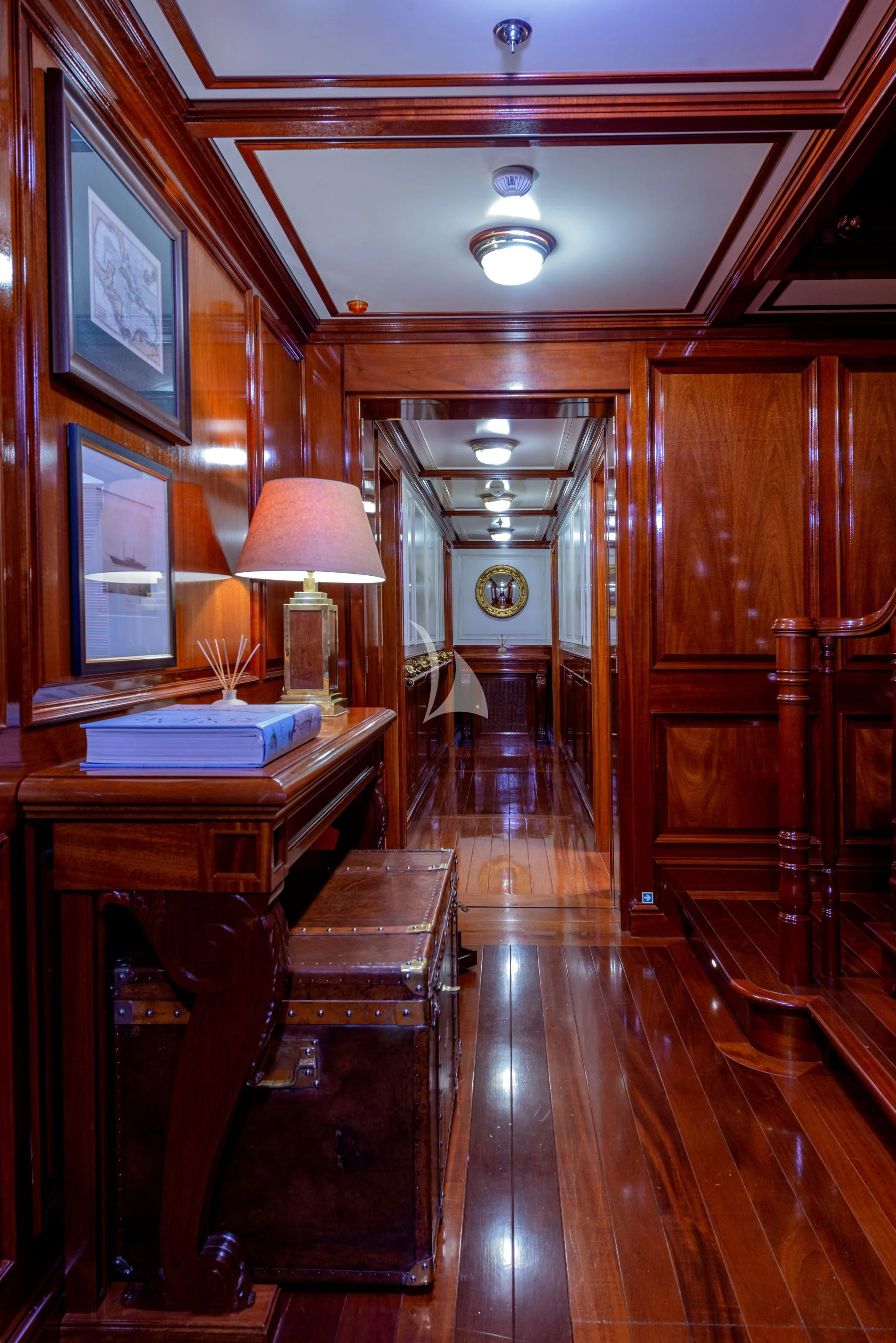 a room with a desk and a lamp aboard STEEL Yacht for Sale