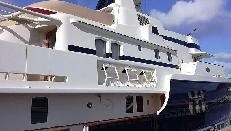 a white building with a sign on it aboard STEEL Yacht for Sale