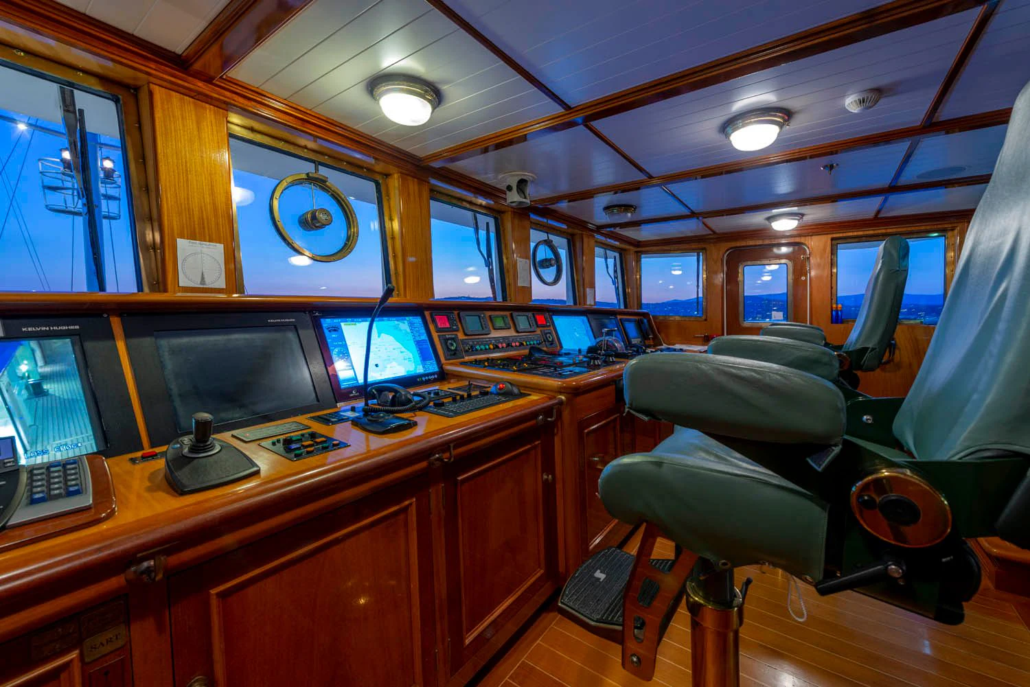 a control room with computers aboard STEEL Yacht for Sale