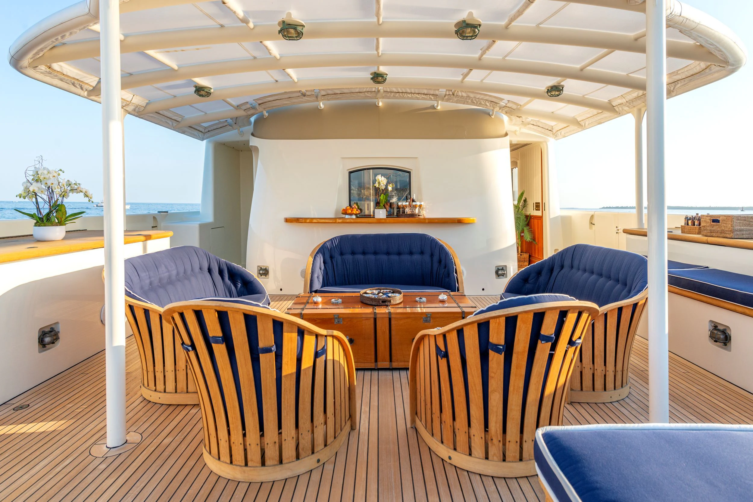 a room with chairs and a table aboard STEEL Yacht for Sale