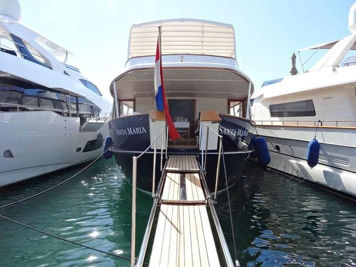 boats docked at a pier aboard SANTA MARIA Yacht for Sale