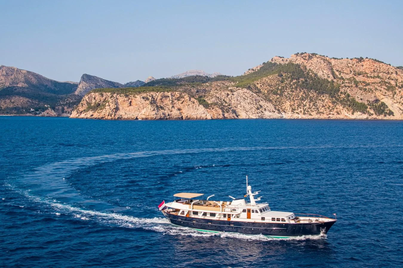 a boat on the water aboard SANTA MARIA Yacht for Sale