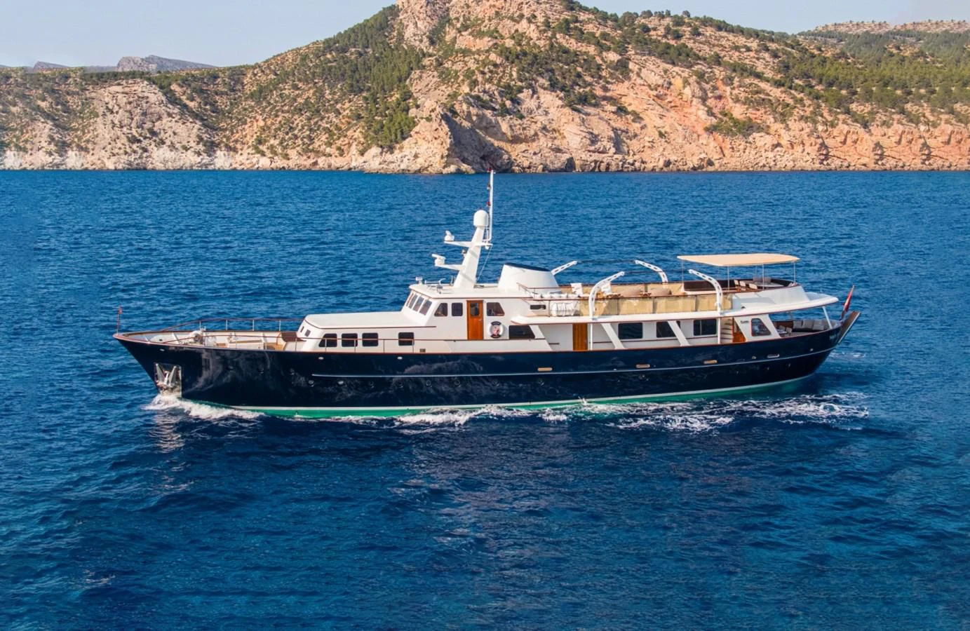 a boat on the water aboard SANTA MARIA Yacht for Sale