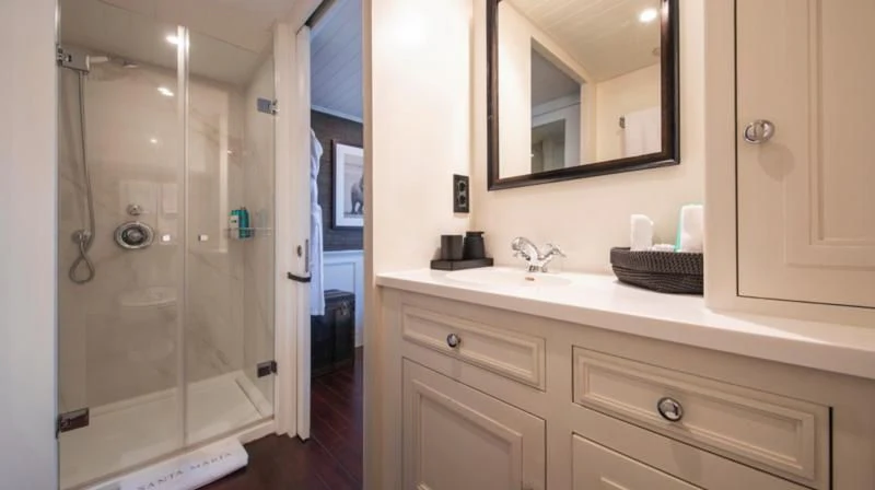 a bathroom with a glass shower aboard SANTA MARIA Yacht for Sale