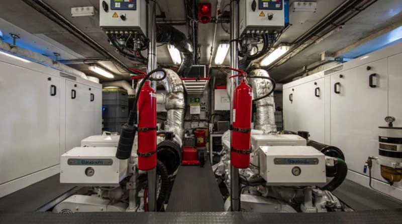 a large machine in a factory aboard SANTA MARIA Yacht for Sale