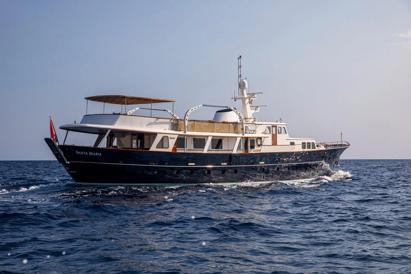 a boat on the water aboard SANTA MARIA Yacht for Sale