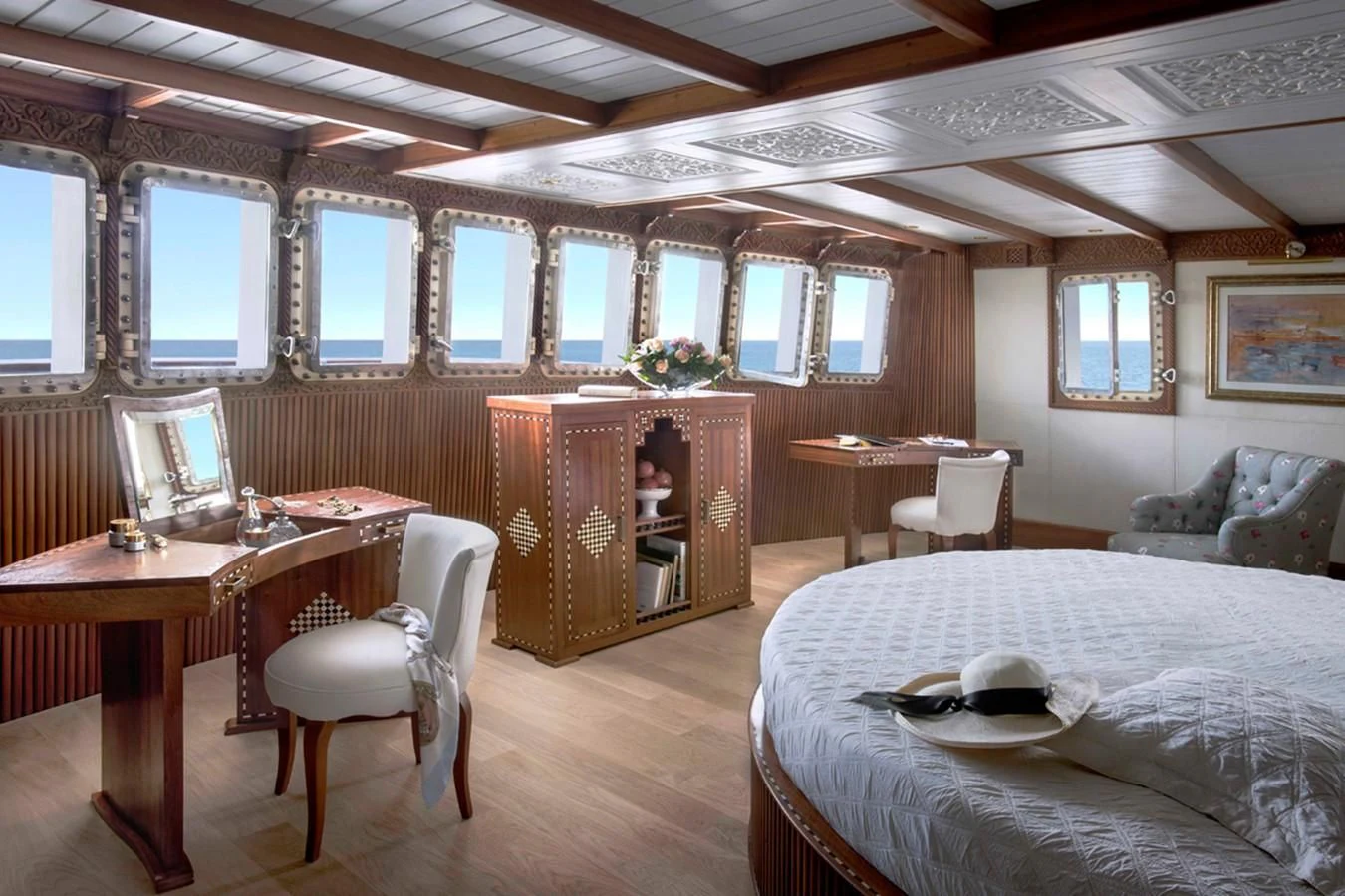 a bedroom with a bed and desk aboard NORTH SEA Yacht for Sale