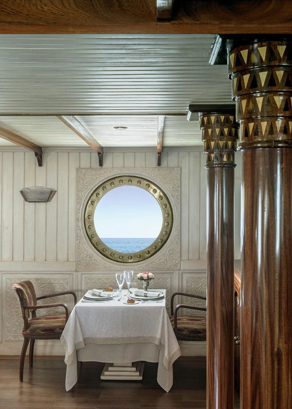 a dining table in a room aboard NORTH SEA Yacht for Sale