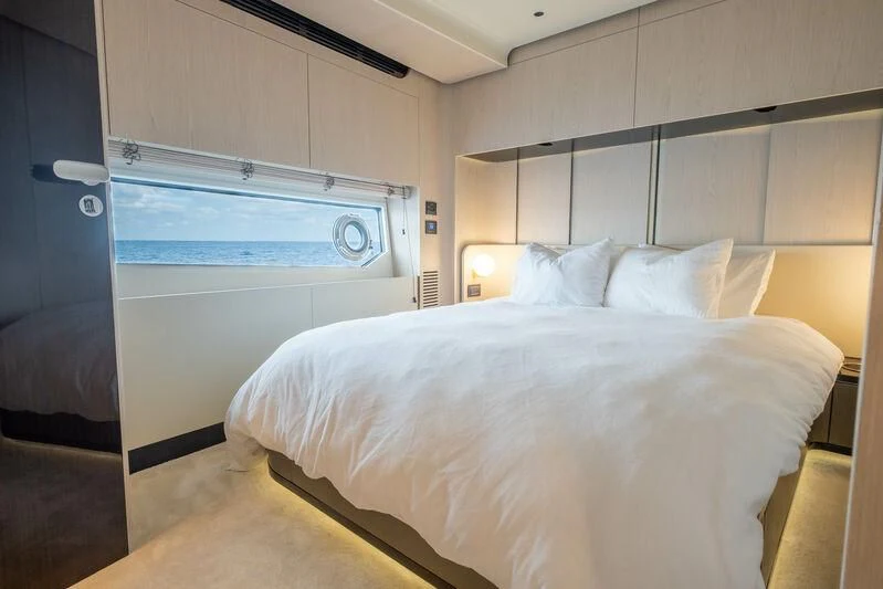 a bed in a room aboard DIAMOND HANDS Yacht for Sale