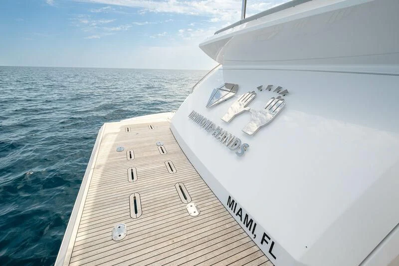 a boat on the water aboard DIAMOND HANDS Yacht for Sale