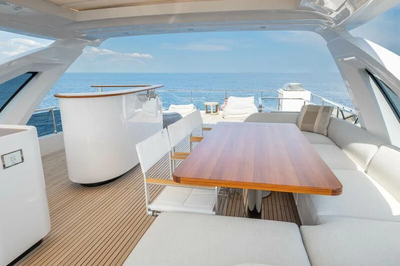 a room with a view of the ocean and the deck aboard DIAMOND HANDS Yacht for Sale