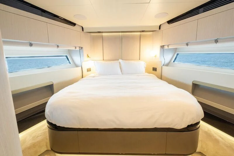 a room with a bed and a window aboard DIAMOND HANDS Yacht for Sale