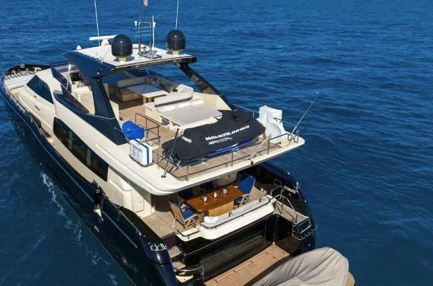 a large ship in the water aboard VITAMIN SEA Yacht for Sale