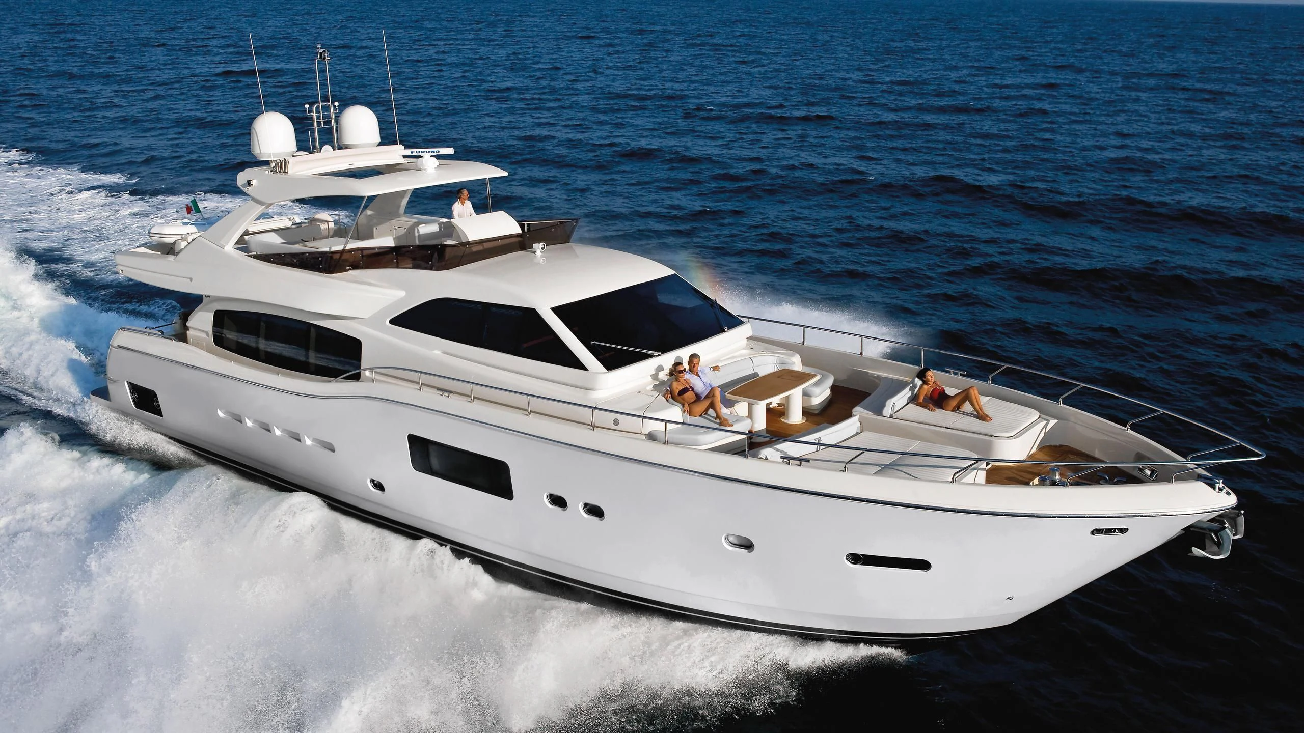 a white yacht on the water aboard VITAMIN SEA Yacht for Sale