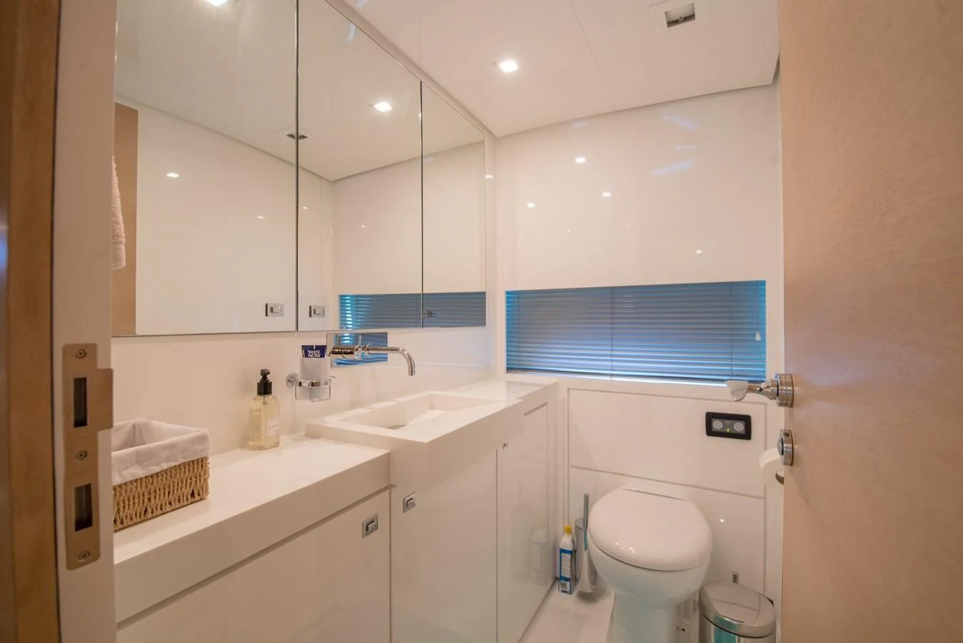a bathroom with a sink and a toilet aboard SUN ANEMOS Yacht for Charter