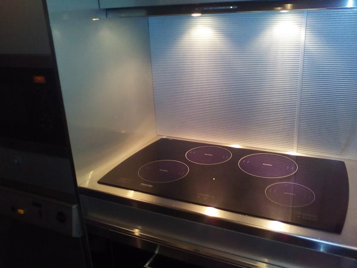 a stove with a purple light aboard SUN ANEMOS Yacht for Charter