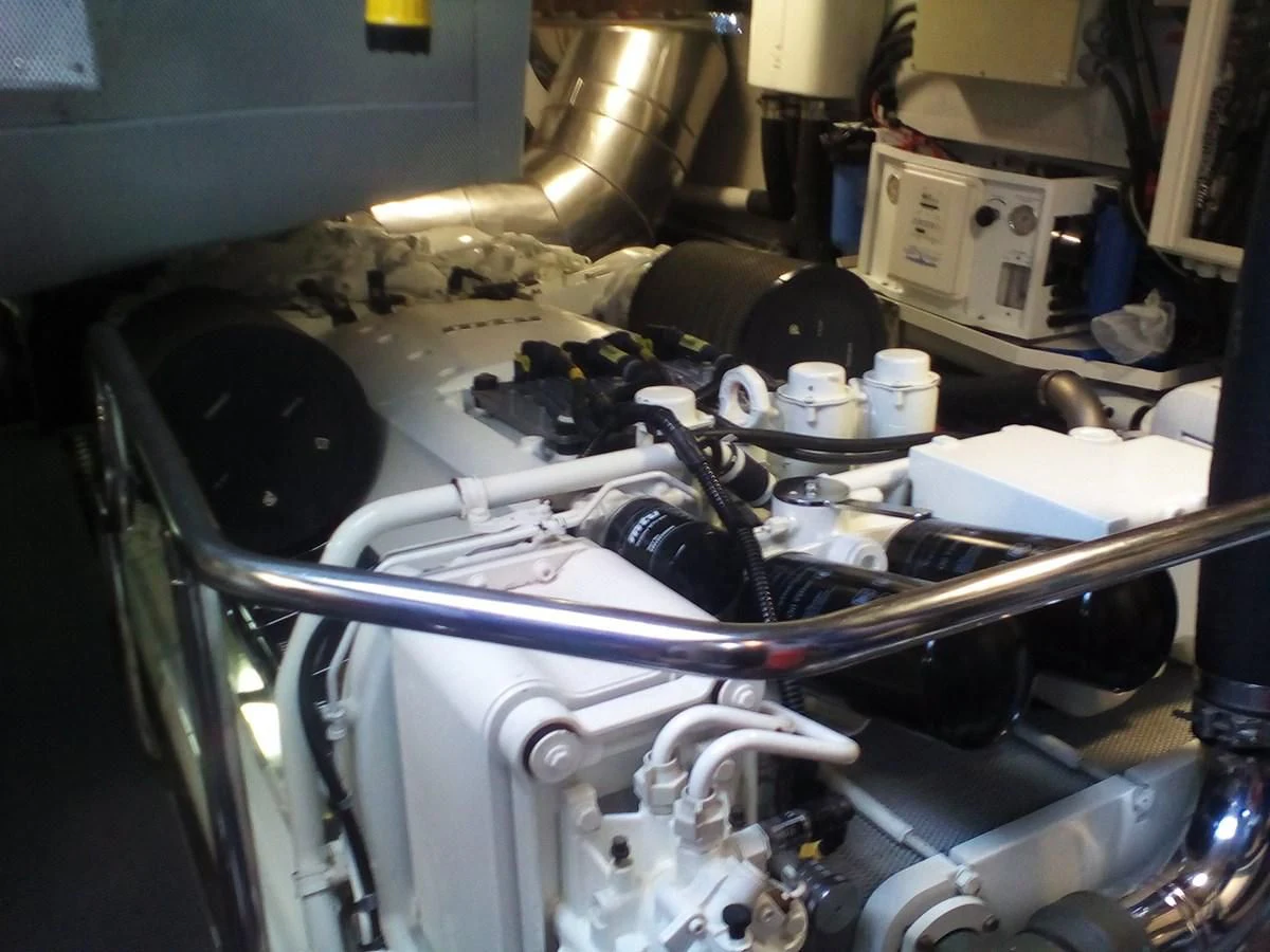 a car with a large engine aboard SUN ANEMOS Yacht for Charter