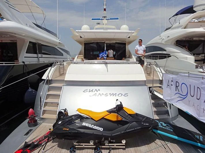 a boat with a surfboard on it aboard SUN ANEMOS Yacht for Charter