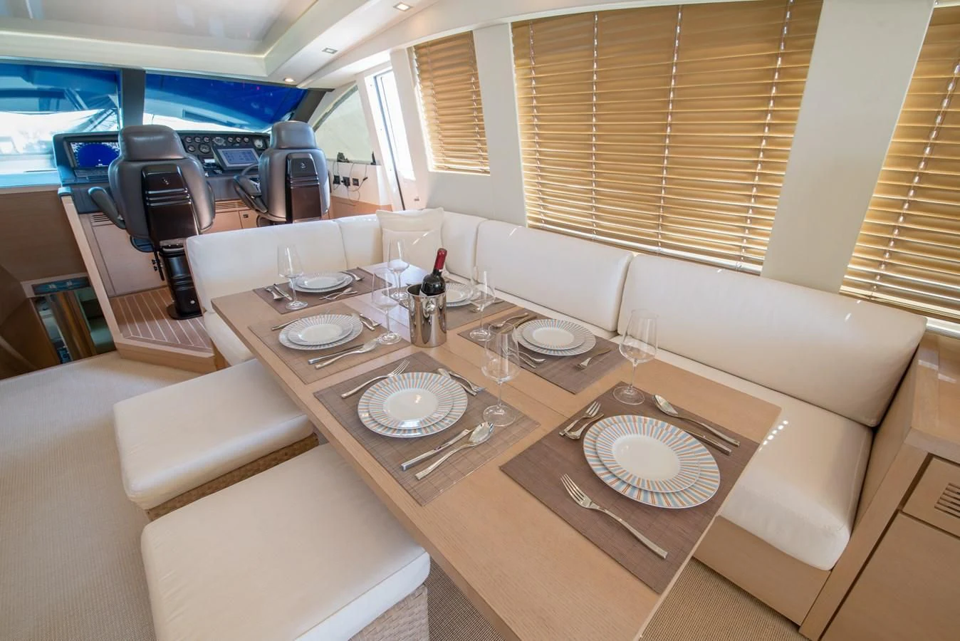 a room with a table and chairs aboard SUN ANEMOS Yacht for Charter