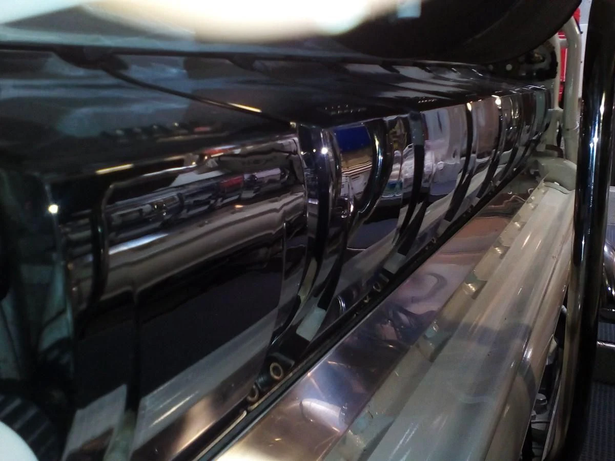 a close-up of a car's hood aboard SUN ANEMOS Yacht for Charter