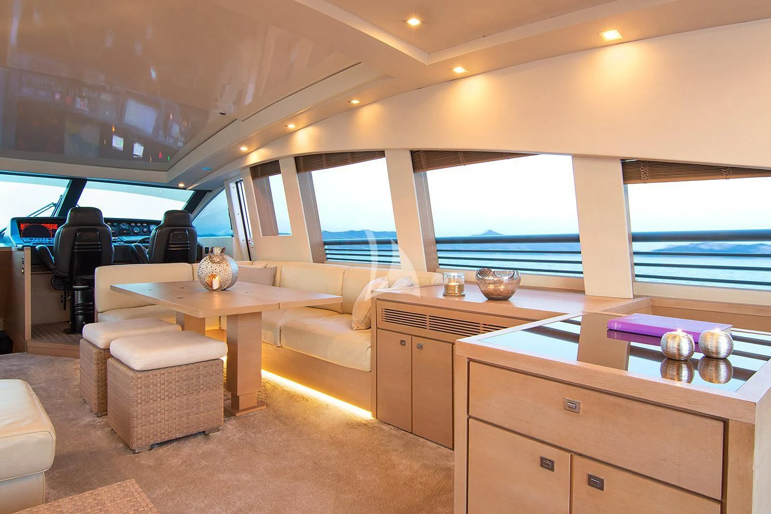 a living room with a large window aboard SUN ANEMOS Yacht for Charter