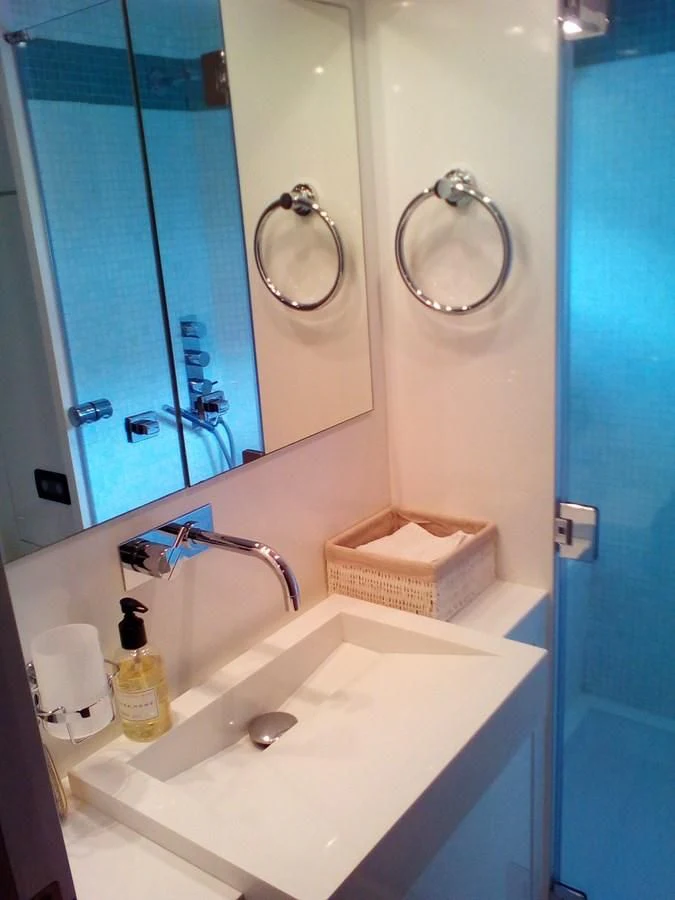 a bathroom with a large mirror aboard SUN ANEMOS Yacht for Charter