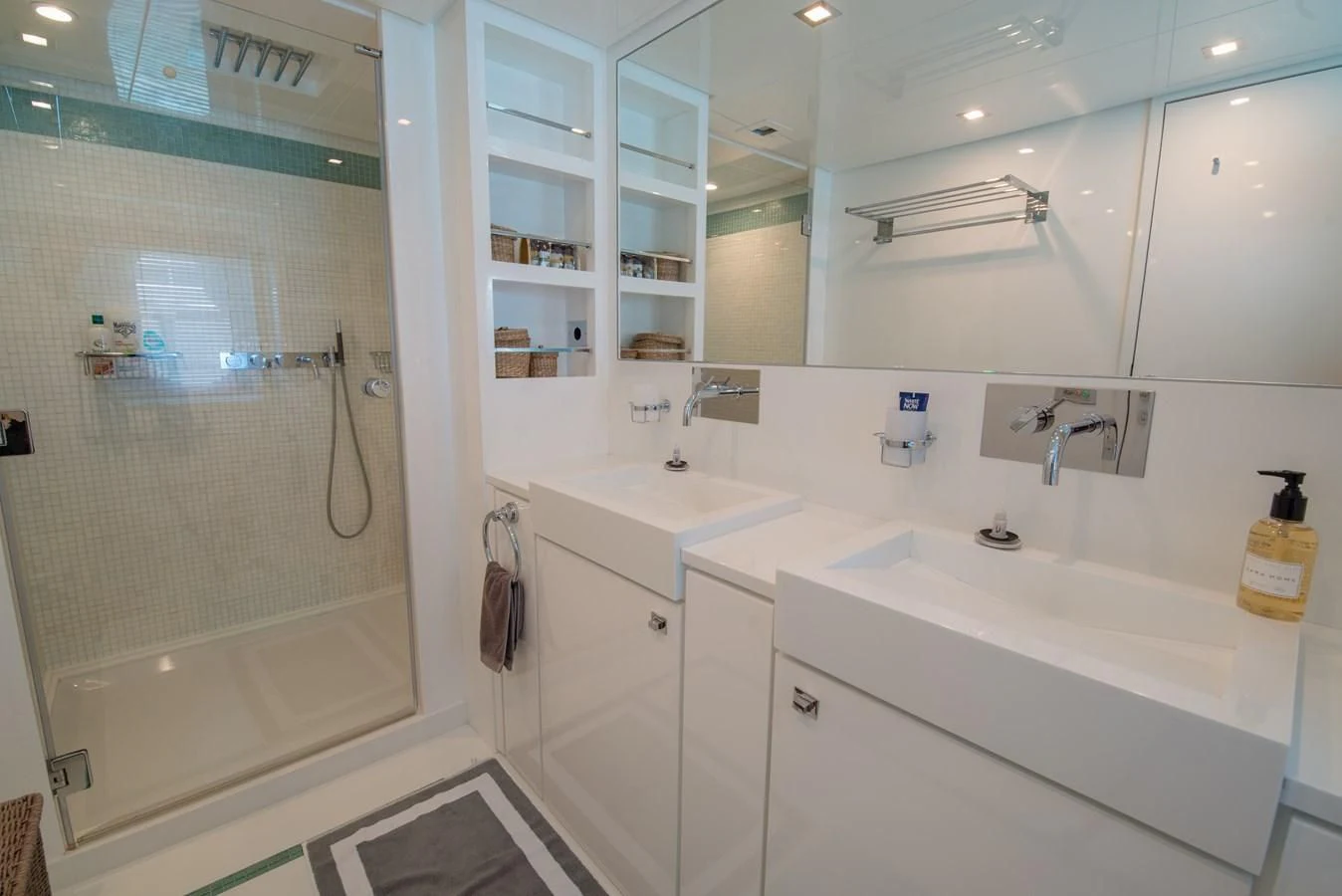 a bathroom with a shower unit and sink aboard SUN ANEMOS Yacht for Charter
