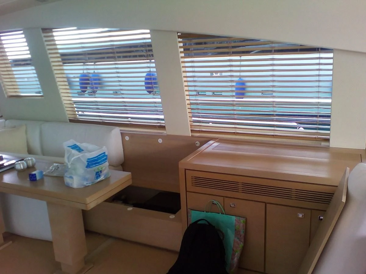 a room with a desk and a window aboard SUN ANEMOS Yacht for Charter