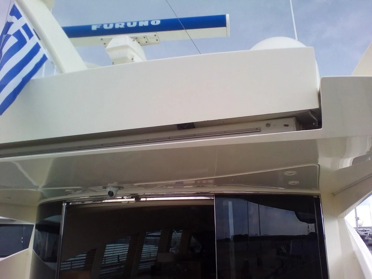 a building with a sign on the wall aboard SUN ANEMOS Yacht for Charter