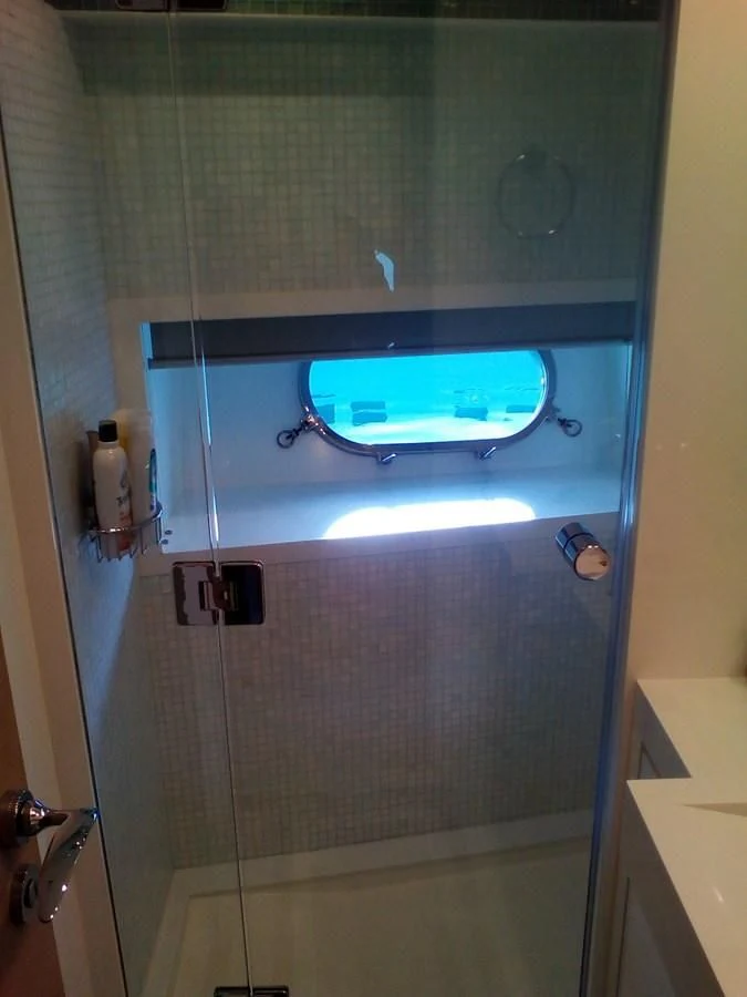 a television on a wall aboard SUN ANEMOS Yacht for Charter